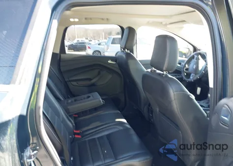 2019 Ford Escape Titanium z USA, uszkodzony, nr VIN 1FMCU9J98KUB43417